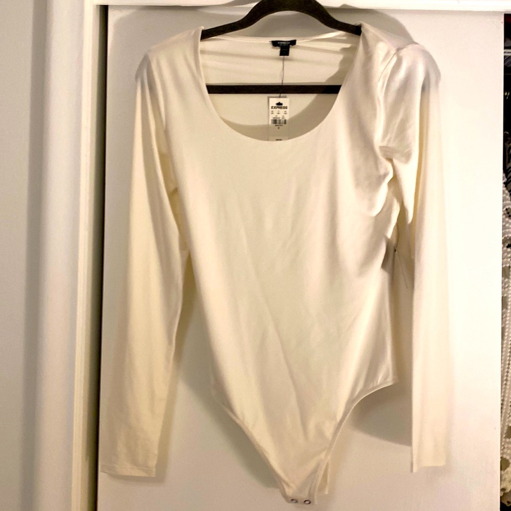 Express white body contour bodysuit. Never worn, tags still on.